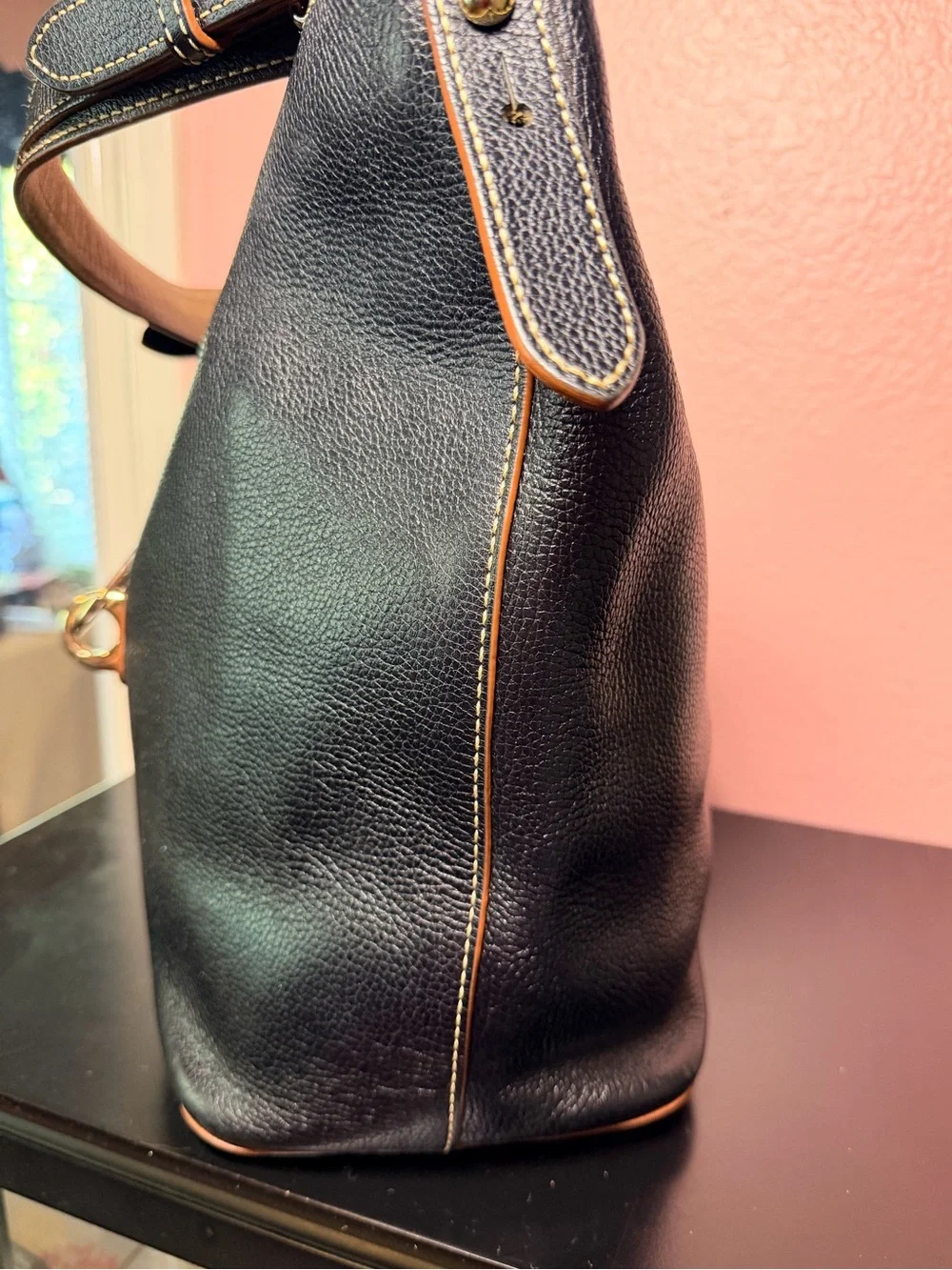 Dooney & Bourke Black Leather Shoulder Bag with Brass Hardware